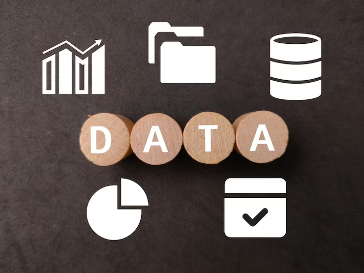 Rounded wooden object with each piece displaying a letter, spelling out "data."