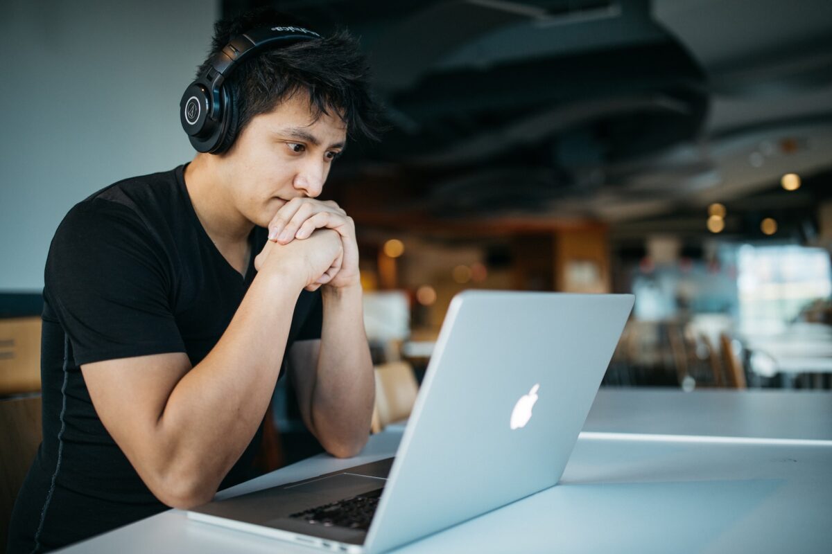 man sitting at a computer